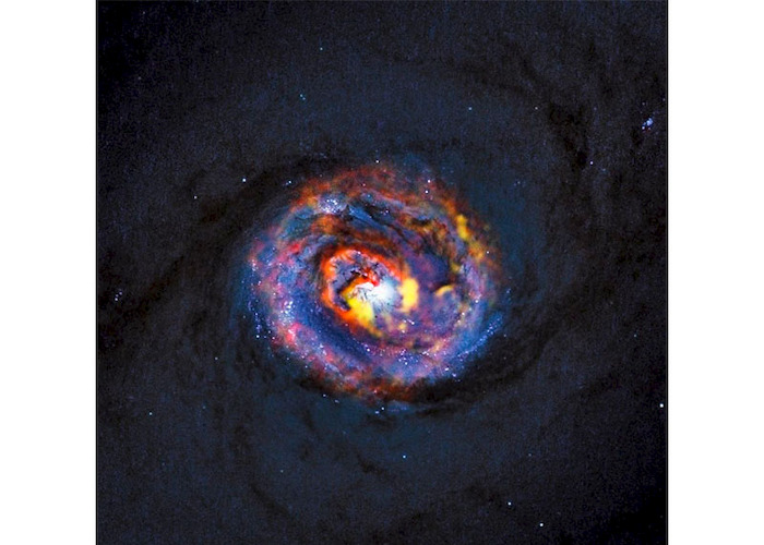 1. Composición de la galaxia NGC 1433 con imágenes de ALMA y Hubble.